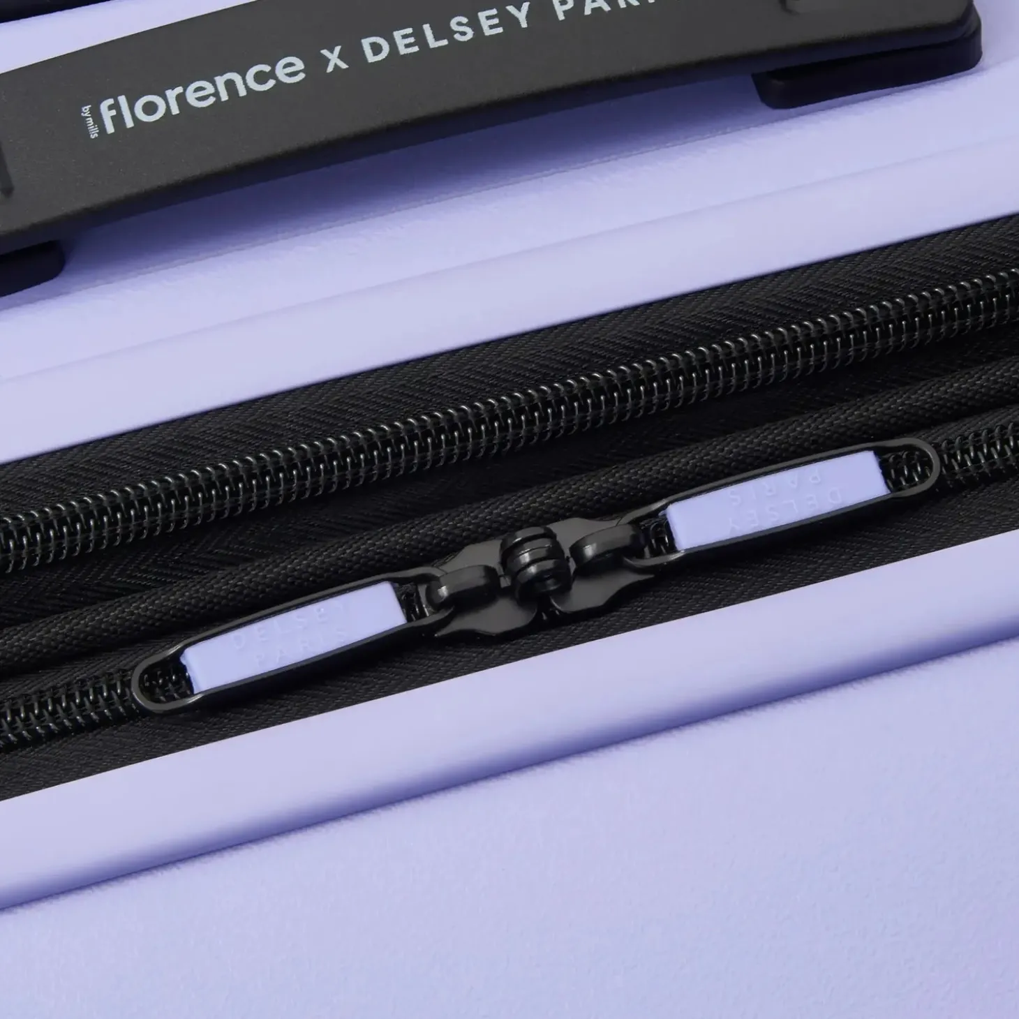Delsey florence by mills Catch Flights Medium Expandable Spinner